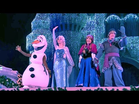 Frozen Holiday Wish castle lighting show debut – Elsa, Anna, Olaf, Kristoff at Walt Disney World