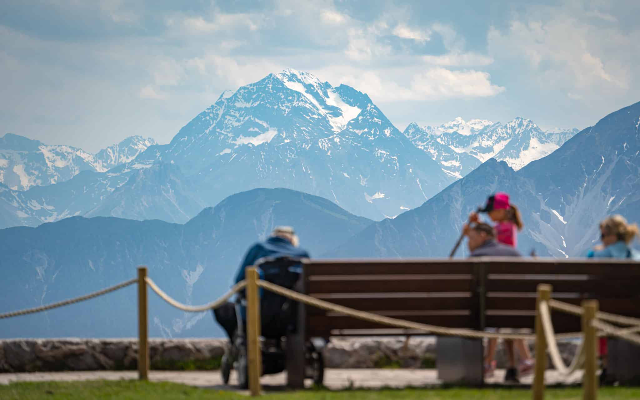 Mountains high above Innsbruck are framed by family outings